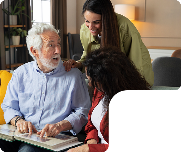 looking at album with elderly a